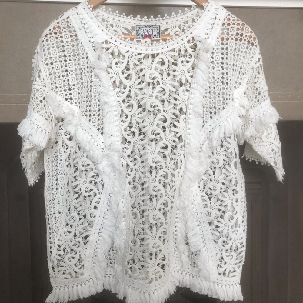 Lace blouse with fringe details